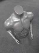 A male mannequin torso