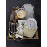 Two boxes containing miscellany to include kitchen scales, vintage soda siphon, dinner ware,