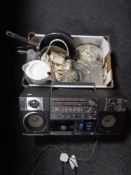 A JVC portable Hi-Fi system together with a box containing Indian tree dinner ware, pans,