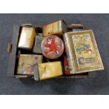 A box of assorted vintage tins
