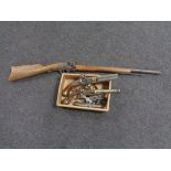 A replica Dutch flintlock rifle together with a box containing three replica flintlock pistols and