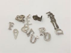 A small quantity of silver charms