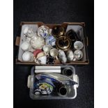 A box containing ceramics including spaniel ornaments, tea china,