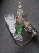 A tray of glass ship in bottle, Edinburgh Crystal paperweight, glass etc.