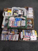 Eight boxes and crates containing assorted DVDs.