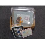A box containing eight framed nursery prints including Disney Jungle Book and Bambi.