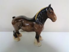 A Beswick shire horse.