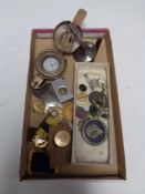 A box containing a brass cased compass, Masonic medals, Britannia cartwheel penny,