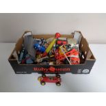 A box containing assorted die cast and plastic vehicles to include Triang Scalextric,