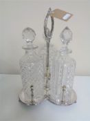 A 20th century plated three way decanter stand,