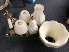 A box containing seven assorted table lamps to include brass, pottery, onyx etc.