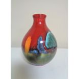 A Poole Pottery small bulbus vase, height 13cm.