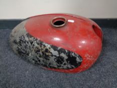 A vintage motorcycle petrol tank.