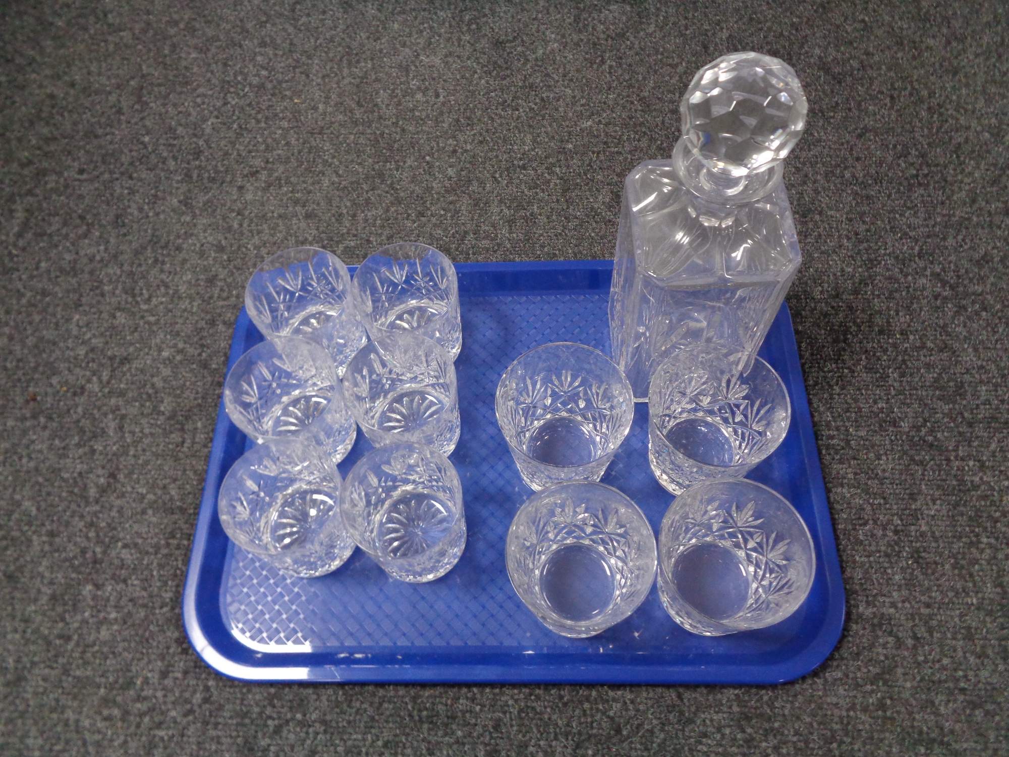 A tray of crystal decanter and glass.