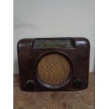 A Bush Bakelite radio (a/f)