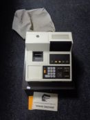 A Busicom NR-110 cash register.