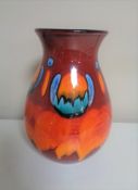 A Poole Pottery vase, marked MS to base, height 26cm.