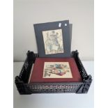 A basket containing a quantity of coloured book plates in mounts depicting Roman and Grecian