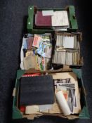 Four boxes of ephemera to include local books, cigarette cards, photo albums, postcards etc.