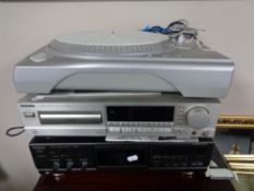 An Ion USB turntable together with a Technics compact disc player and a Technics stereo cassette