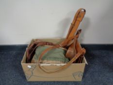 A box containing wicker fishing creel, Hardy rod bag, gun bag etc.