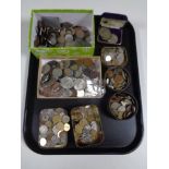 A tray containing a large quantity of assorted foreign coinage, Chinese coins, crowns etc.