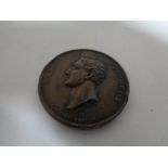 A bronze Earl of Plymouth medal.