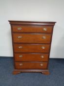 A Stag five drawer chest.