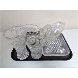 A tray containing 20th century glassware to include trinket tray, two vases and two bowls.
