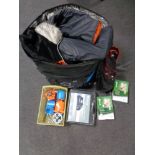 A large delivery bag containing Regatta rucksack, trainers, assorted clothing,