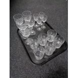 A tray of crystal whiskey, wine and liqueur glasses, to include Edinburgh Crystal amongst it.