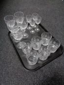 A tray of crystal whiskey, wine and liqueur glasses, to include Edinburgh Crystal amongst it.