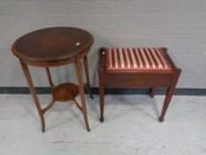 An inlaid mahogany storage piano stool together with a circular inlaid mahogany occasional table.