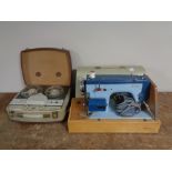 A cased Jones electric sewing machine together with a vintage Fidelity reel to reel player.