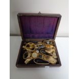 A box containing a collection of assorted ladies and gents gold plated wristwatches.