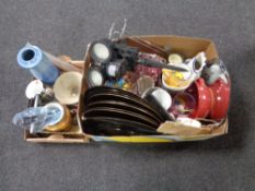 Two boxes containing miscellany to include a garden security light, treen biscuit barrel,