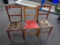 A pair of Edwardian bedroom chairs together with a further bedroom chair.