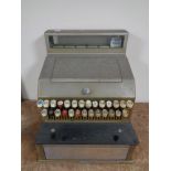 A vintage Gross pre decimal cash register with key.