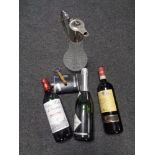 A cut glass and silver plated claret jug together with two bottles of wine and a bottle of Alliance