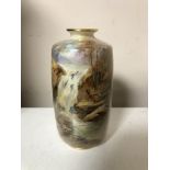 A Royal Worcester hand painted vase depicting pheasant by a waterfall, signed J.