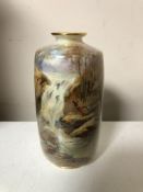 A Royal Worcester hand painted vase depicting pheasant by a waterfall, signed J.