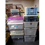 A quantity of plastic storage boxes and folding crates.