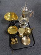 A tray containing a glass and metal wine carafe on stand,