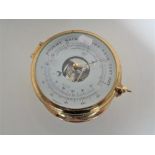 A brass cased ship's style precision barometer.