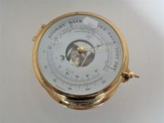 A brass cased ship's style precision barometer.