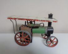 A Mamod steam tractor.