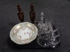 A tray containing a pair of Edwardian wooden candlesticks, a continental gilded china comport,