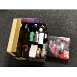 A box containing quantity of after shaves and perfumes to include Hugo Boss, Burberry, Ralph Lauren,