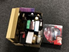 A box containing quantity of after shaves and perfumes to include Hugo Boss, Burberry, Ralph Lauren,