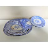 Twelve antique blue and white dinner plates and meat plates.